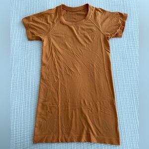 Orange Lululemon Swiftly Tech Hip Length